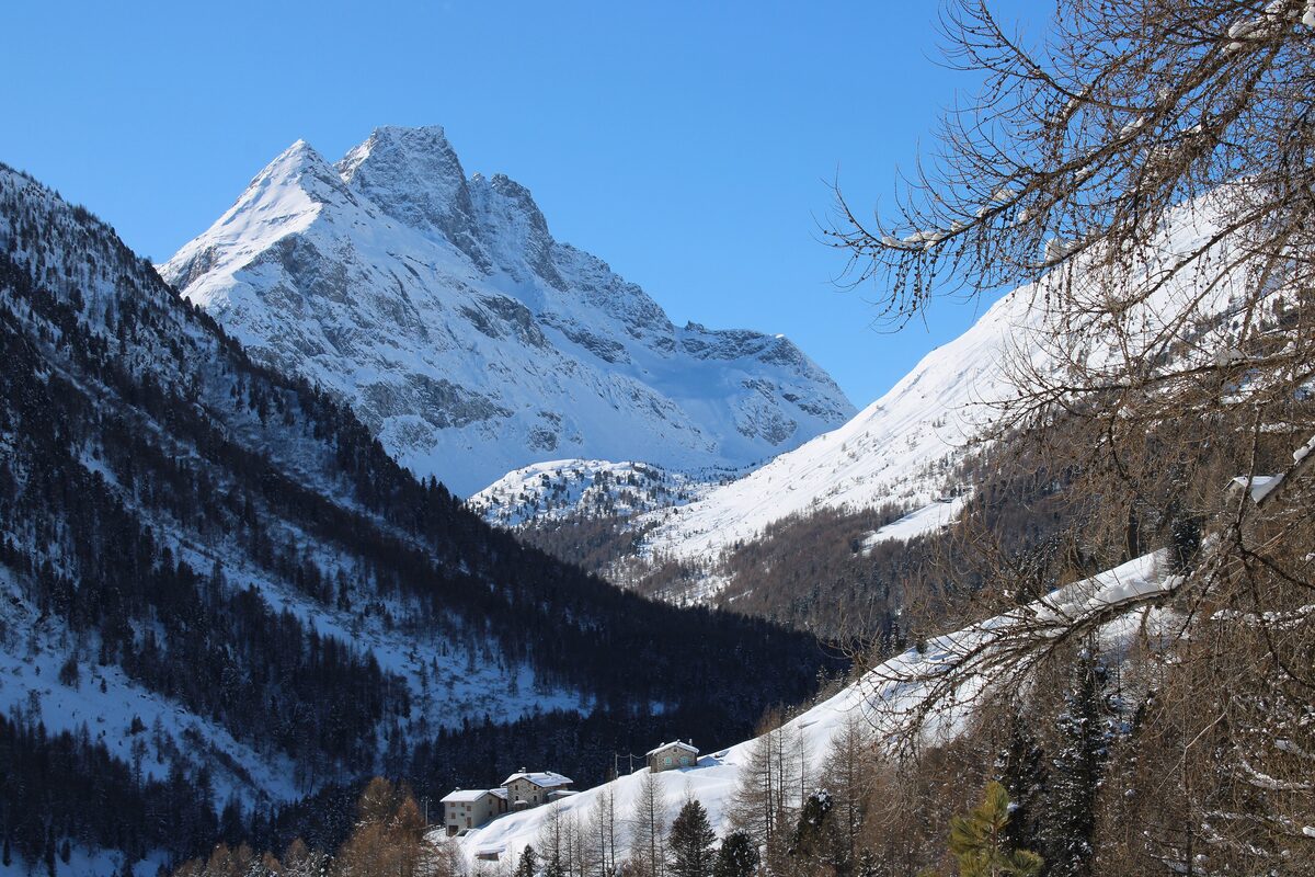 Snow-covered peaks of the Corno di Dosdè above the Val Viola Bormina in the Valdidentro valley