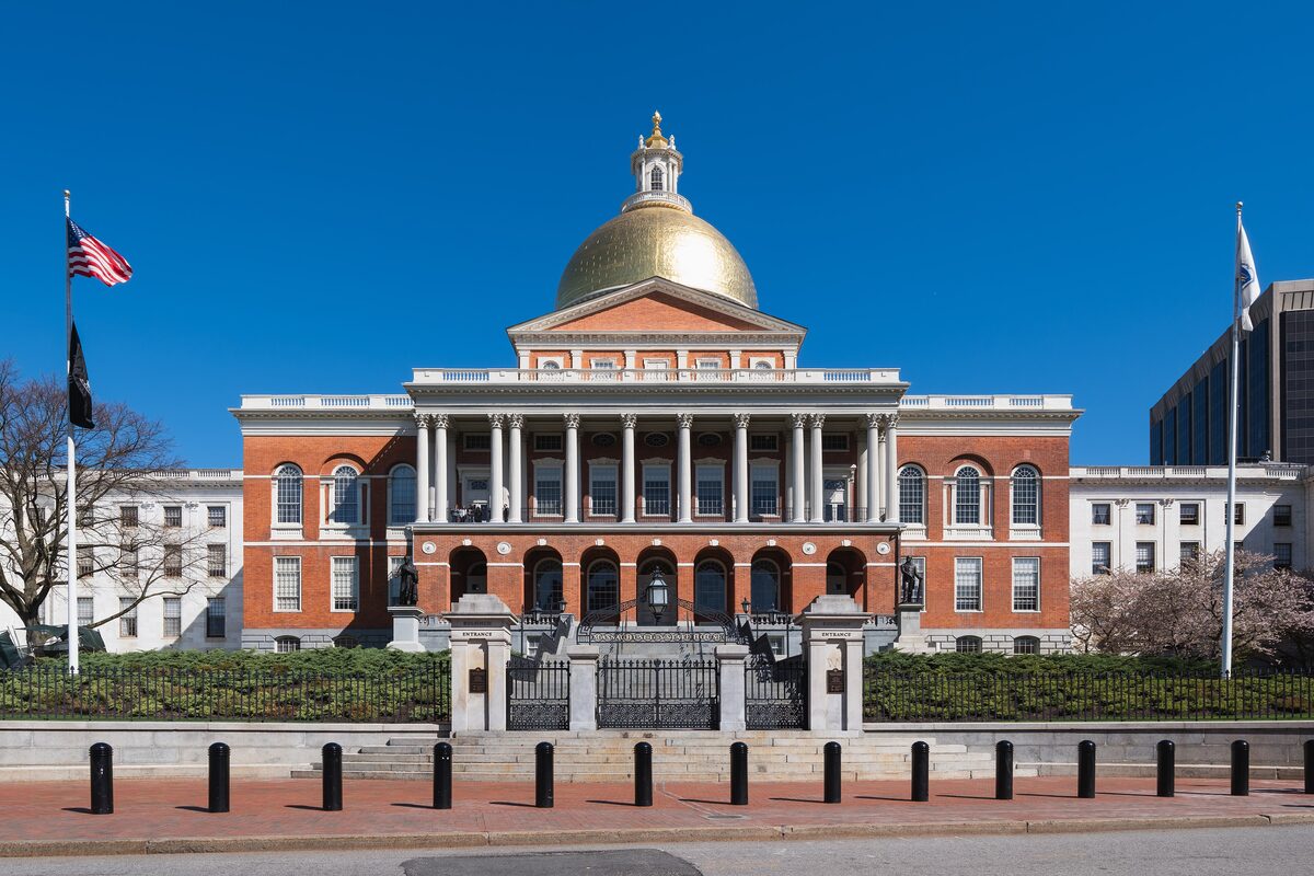 The golden dome and red-brick front of the Massachusetts State House
