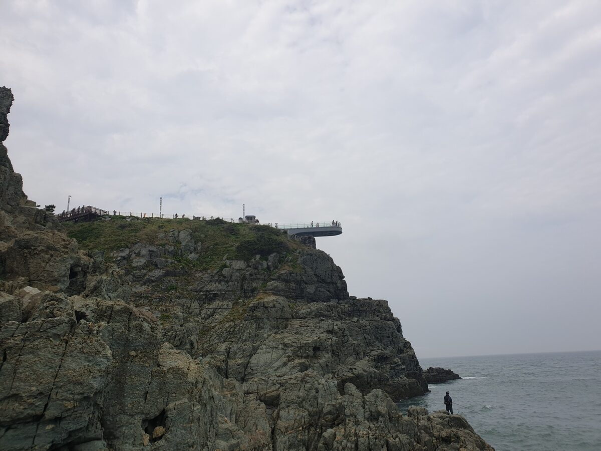 The Oryukdo Skywalk, a viewing platform reaching out over a rocky cliff above the sea