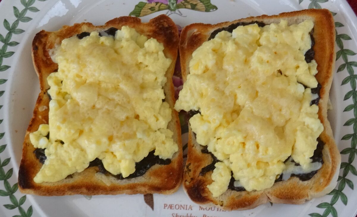 Laverbread, a dark seaweed purée, on toast with scrambled egg and cheese