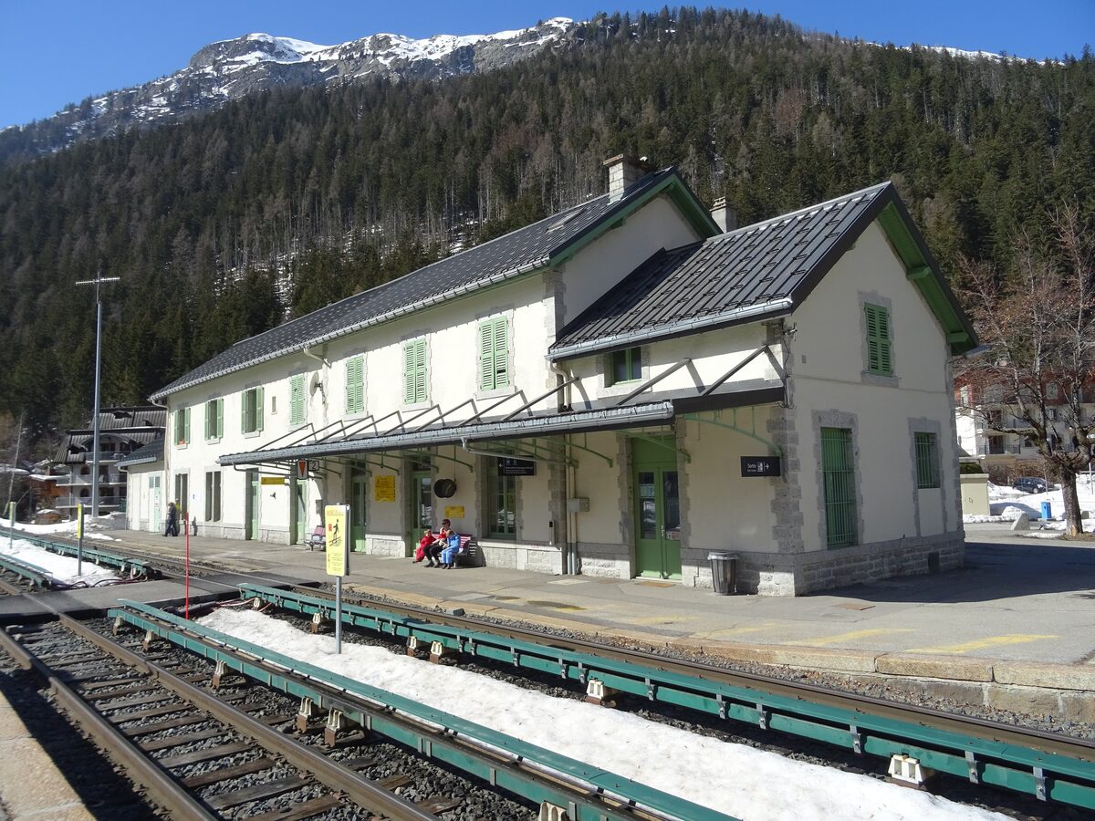 The Argentière railway station building with snow at the edge of the platform
