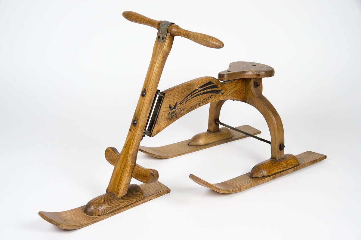 An early wooden ski-bike with two short skis, one of the objects from the Chamonix Alpine Museum collection