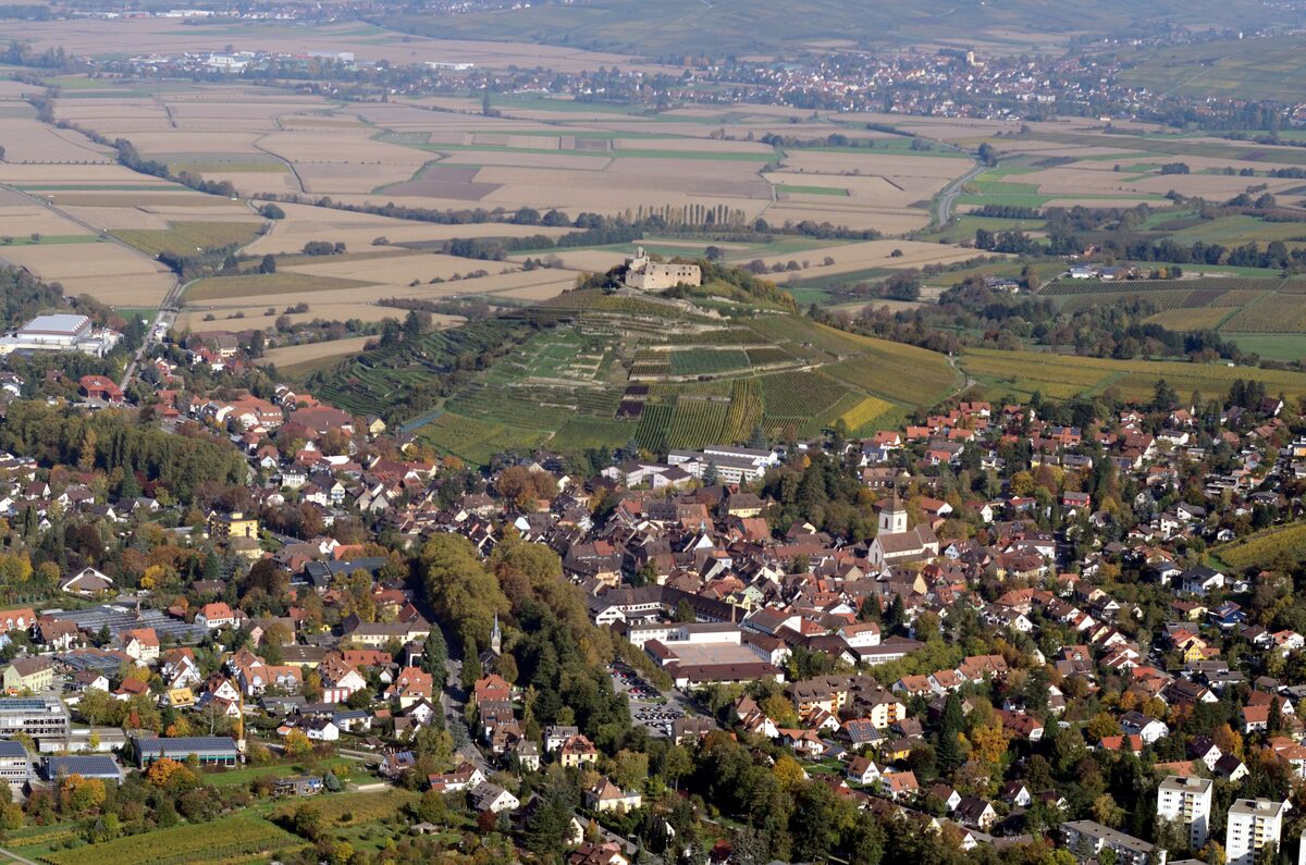 Aerial view of Staufen im Breisgau with the castle ruin on its vineyard hill above the town