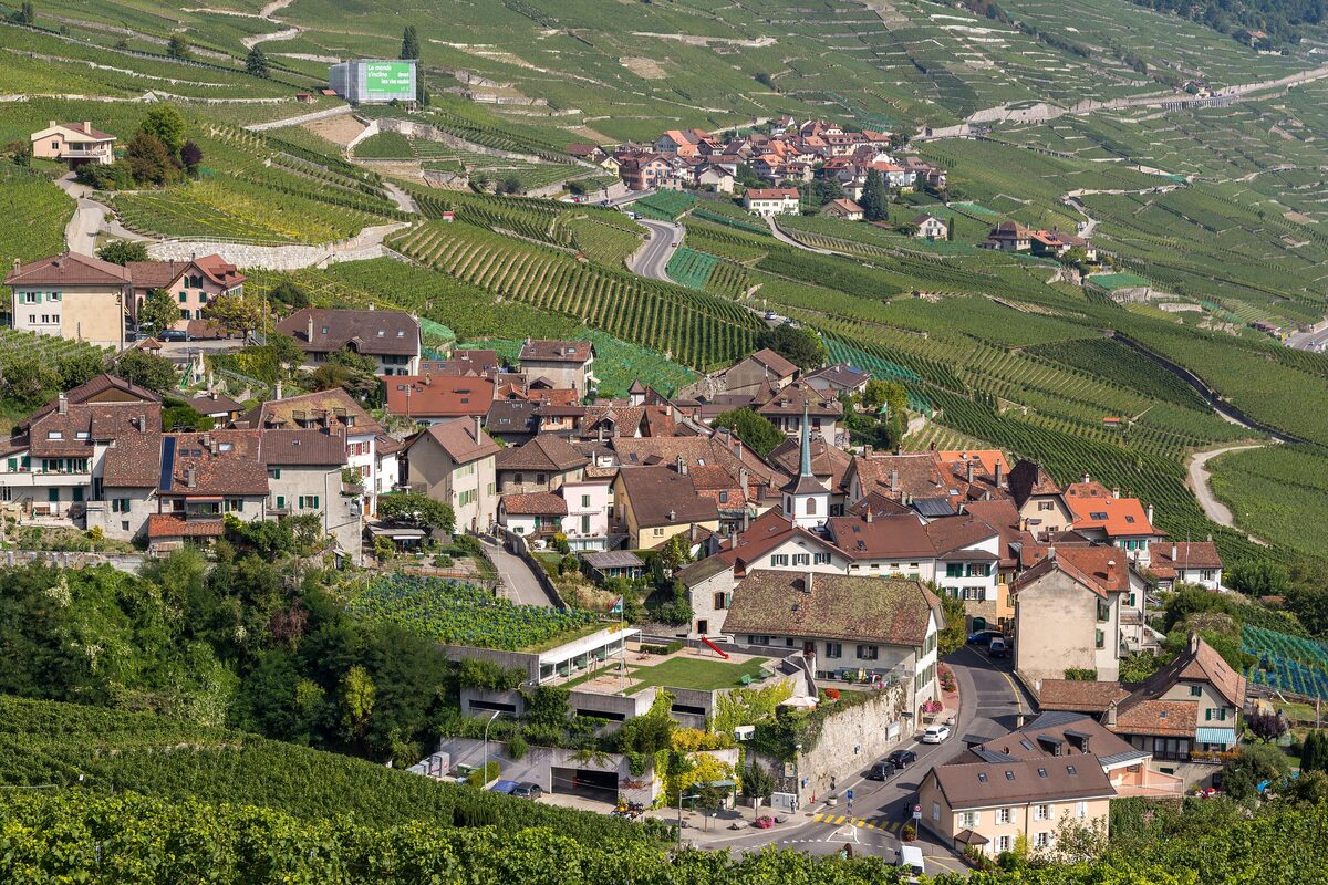 The wine villages of Riex and Epesses among the terraced vineyards of Lavaux, with red-tiled roofs and a small church spire