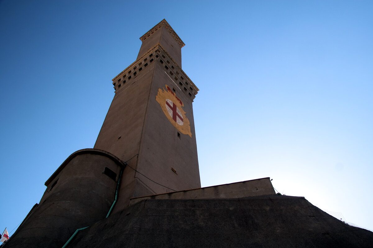 The Lanterna lighthouse tower with the coat of arms of Genoa on its side