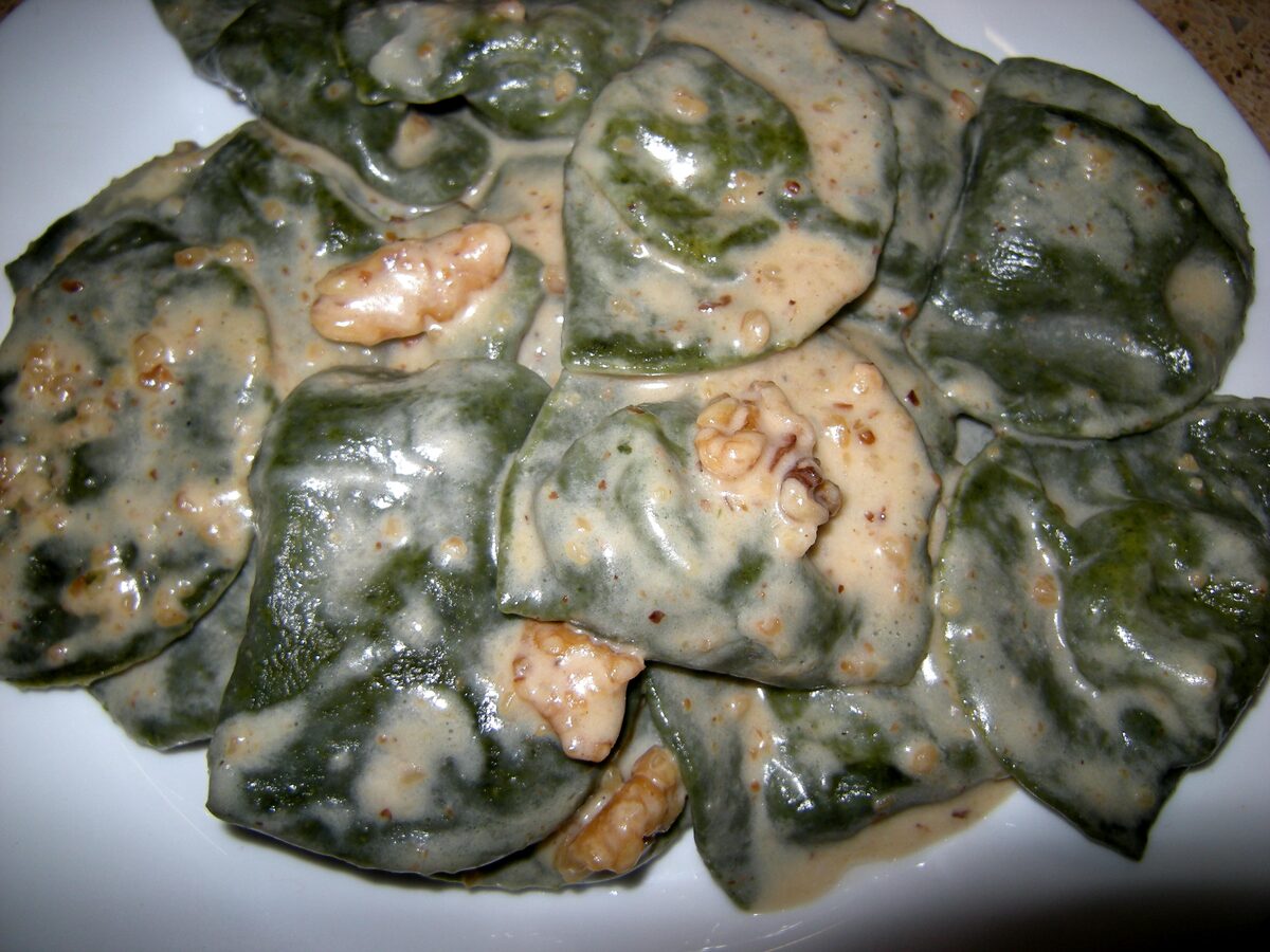 Pansoti, herb-filled pasta, in a creamy walnut sauce with walnut pieces