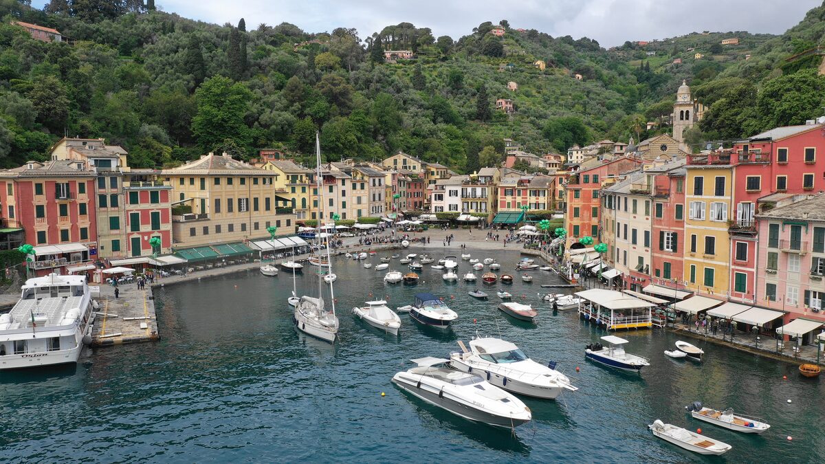 The pastel waterfront houses and yachts of Portofino harbor