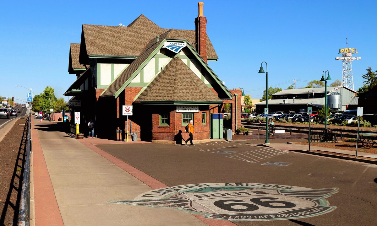 The Route 66 shield painted on the pavement outside Flagstaff's historic depot