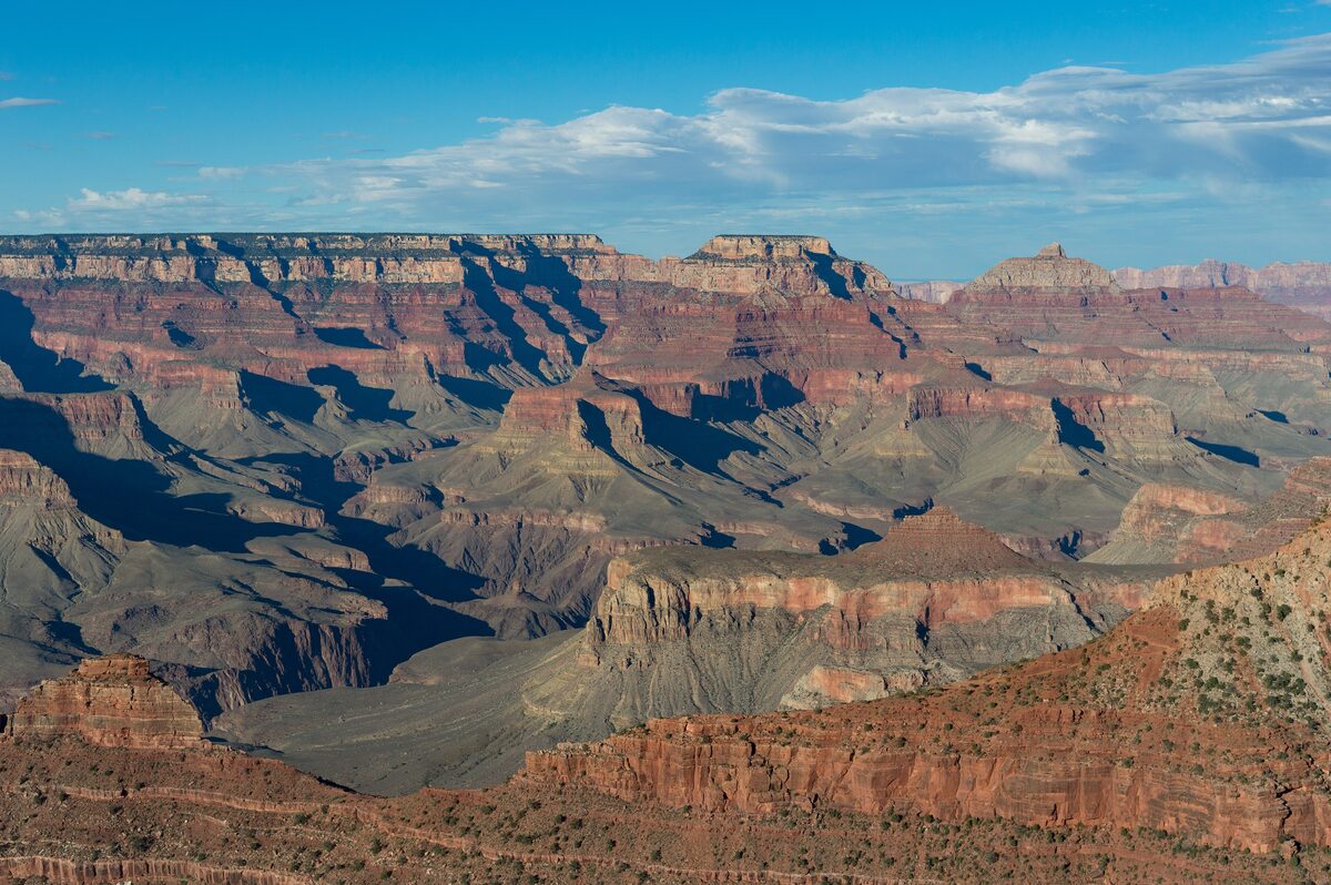 Layered red canyon walls and shadowed gorge seen from Mather Point