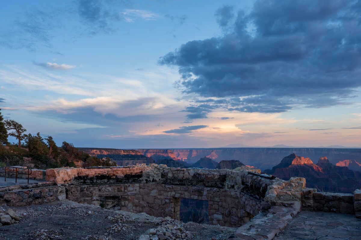Sunset sky over the canyon from the ruined terrace of the North Rim lodge