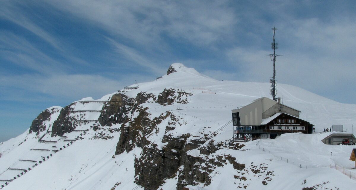 The Männlichen summit station on a snowy ridge