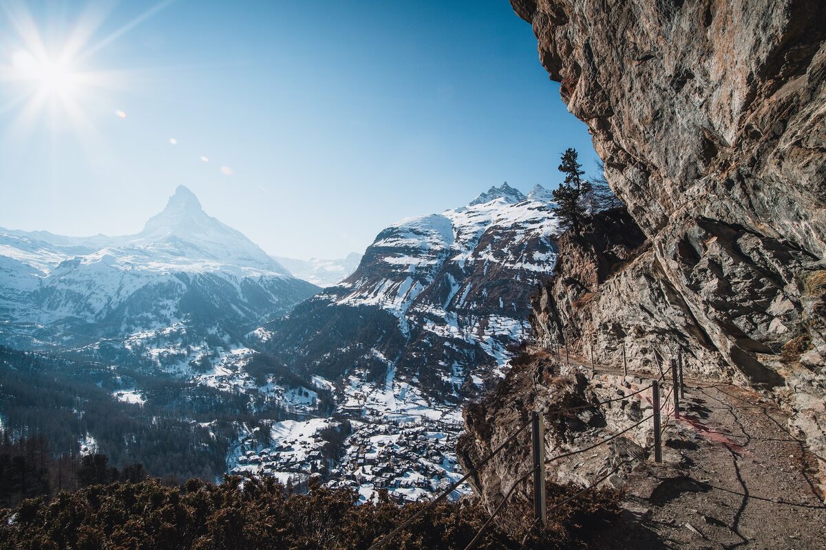 The Matterhorn above the snowy village of Zermatt on a sunny winter day