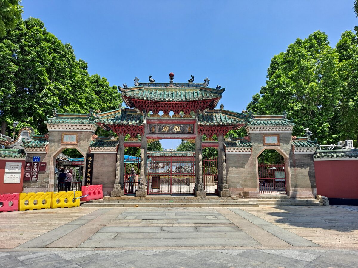 The green-tiled ceremonial gateway at the entrance of Foshan Ancestral Temple