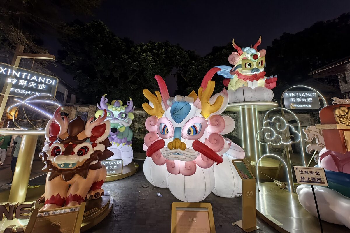 Illuminated dragon lanterns set up at night in Lingnan Tiandi for Chinese New Year