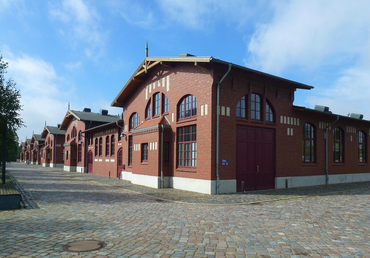 The red-brick emigrant halls of BallinStadt on Veddel, with a cobbled street running alongside