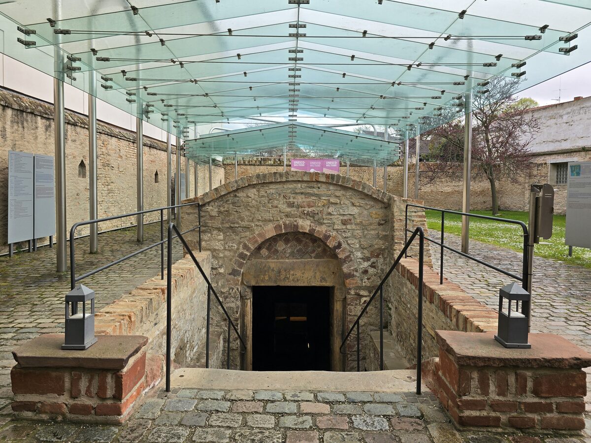 The glass-roofed entrance and stairs down to the medieval mikveh in Speyer's Judenhof