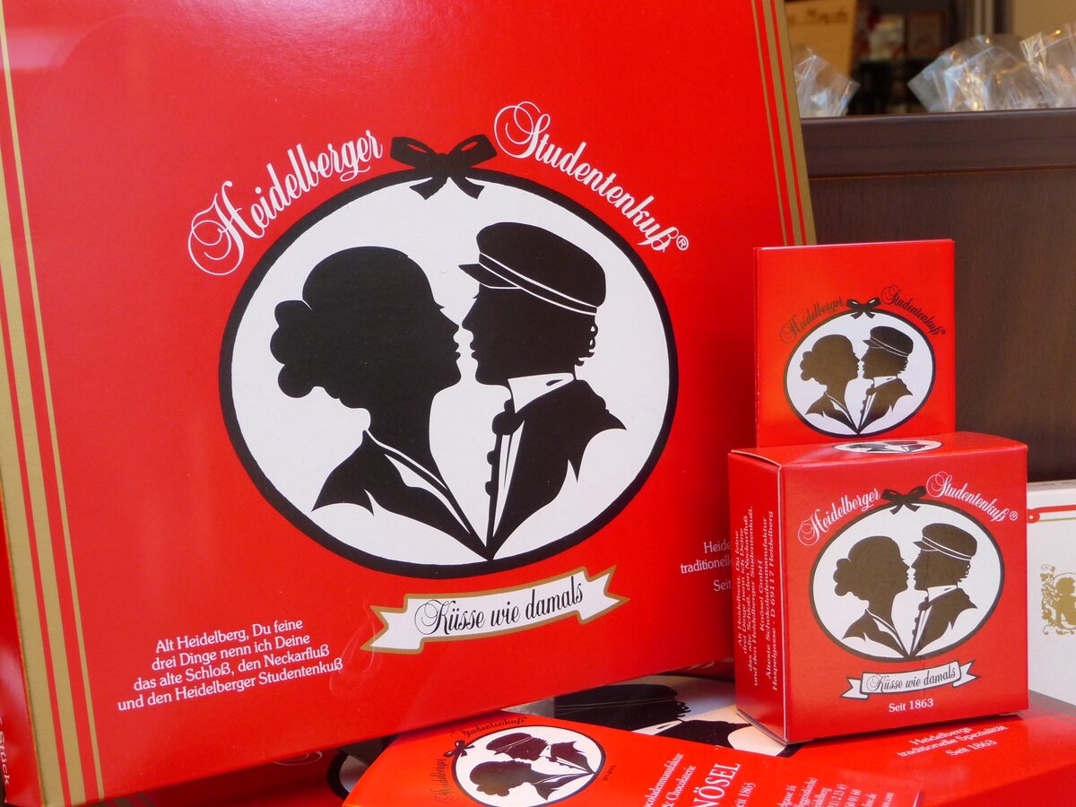 Red boxes of Heidelberger Studentenkuss chocolates with the silhouette of a kissing couple on the lid