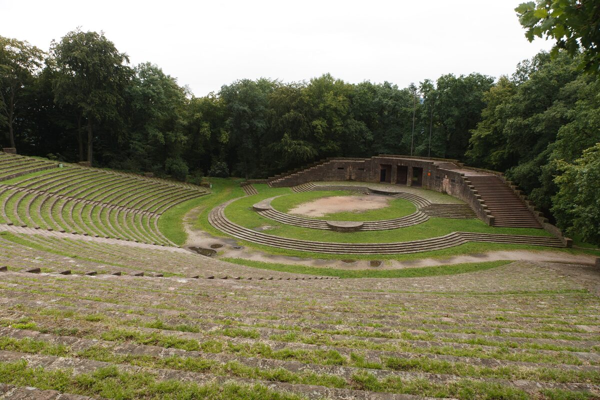 The grassy stepped seating of the Thingstätte amphitheater in the forest on the Heiligenberg