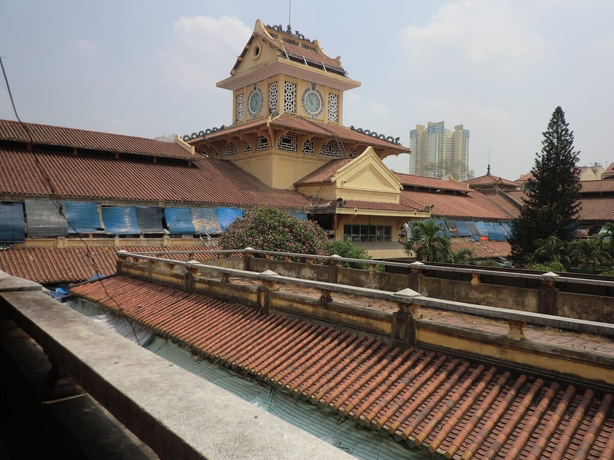 The Chinese-style Bình Tây Market hall with its clock tower and tiled roofs