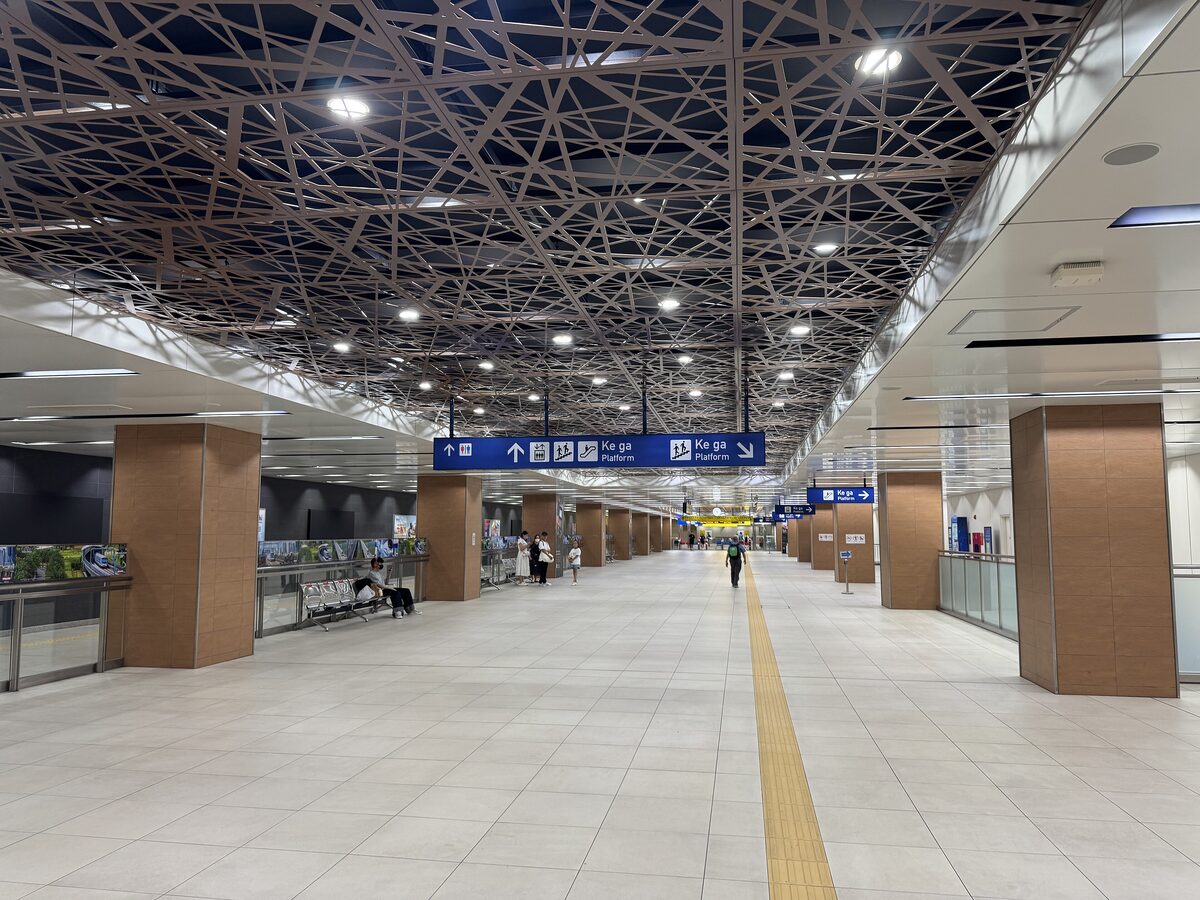 The concourse of Opera House station on Metro Line 1, with its lattice ceiling and tiled floor