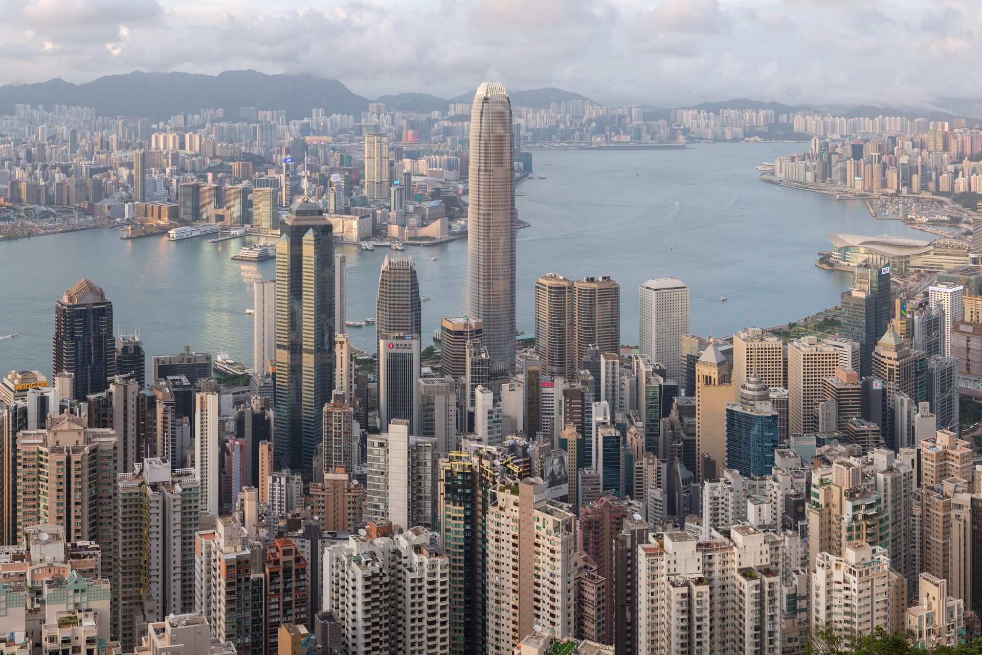 Hong Kong Island towers and Victoria Harbour seen from Lugard Road on Victoria Peak on a soft, hazy day, with Kowloon across the water
