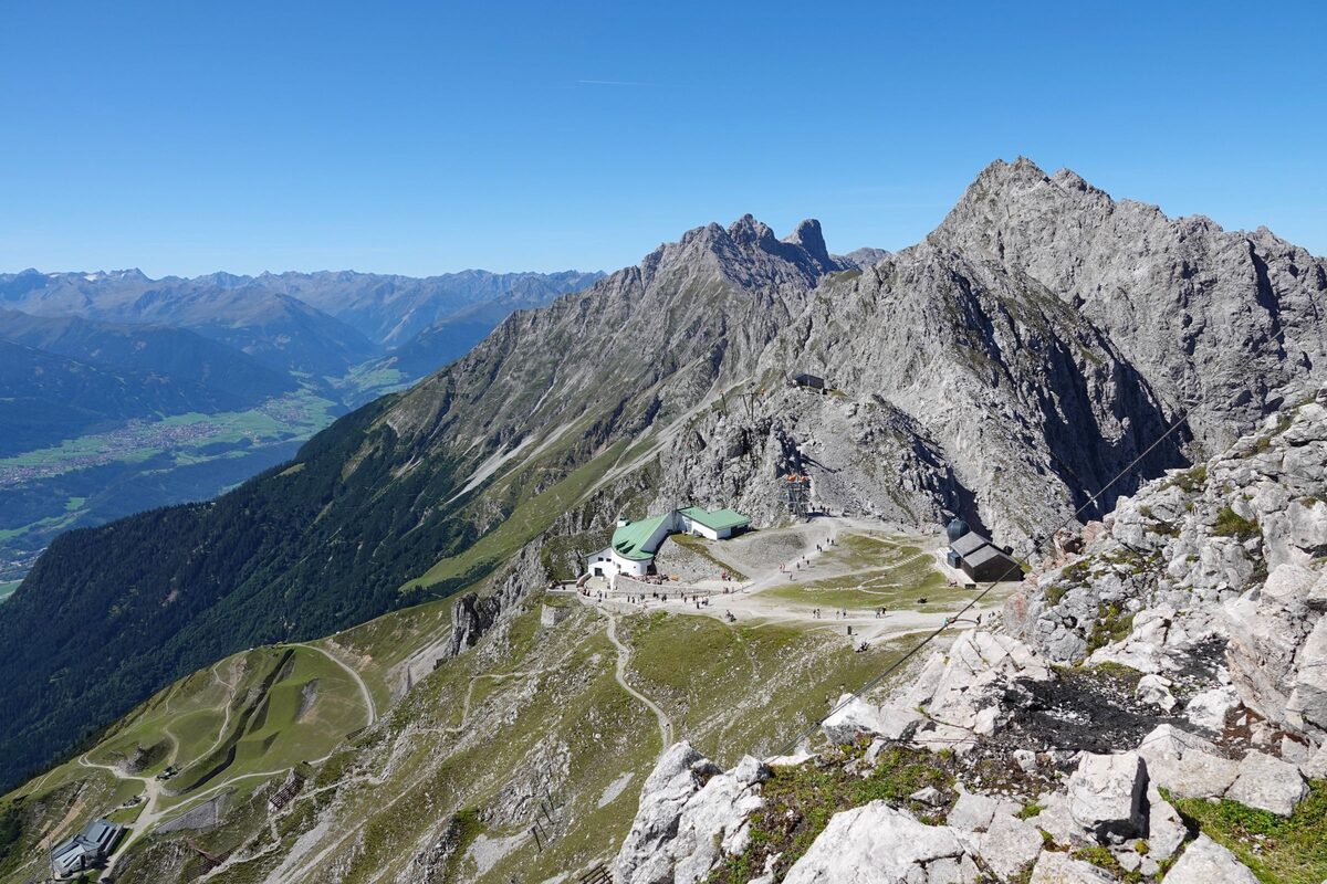 The rocky peaks of the Nordkette above the Seegrube cable car station, with the Inn valley far below