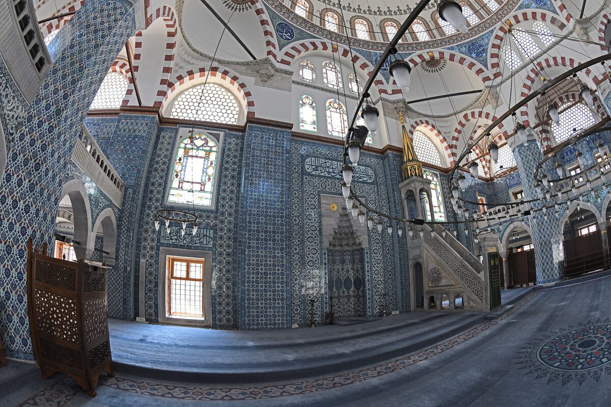 The interior of the Rüstem Pasha Mosque, its walls and piers covered in blue İznik tiles