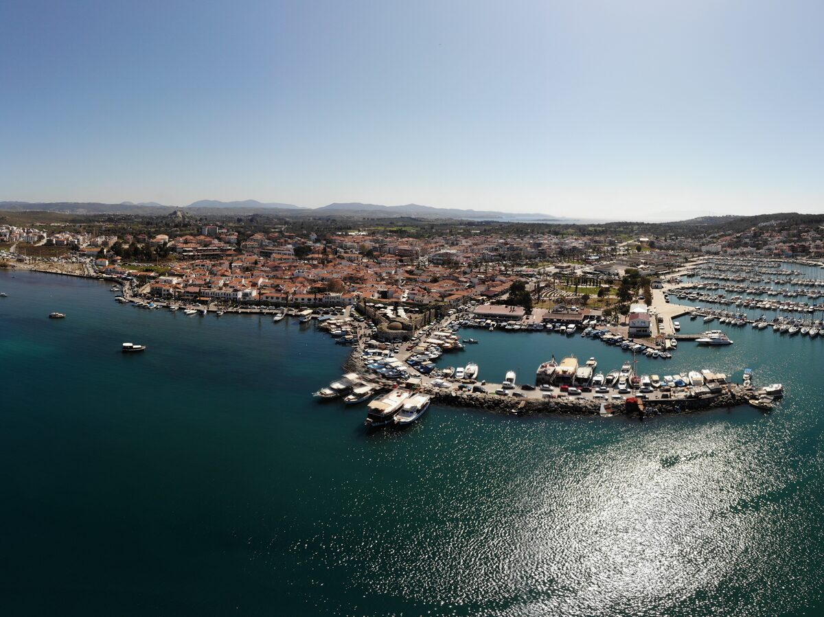 Aerial view of Sığacık, with its Ottoman castle walls enclosing the old village and the harbor and marina in front