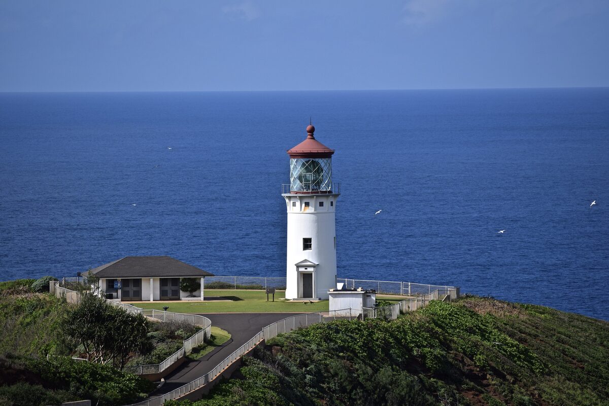 White Kīlauea Point lighthouse above the deep blue Pacific