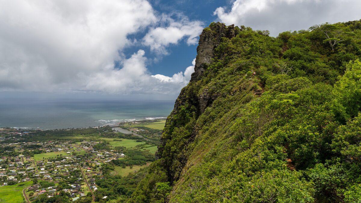 Steep green Sleeping Giant ridge above Kapaʻa and the coast
