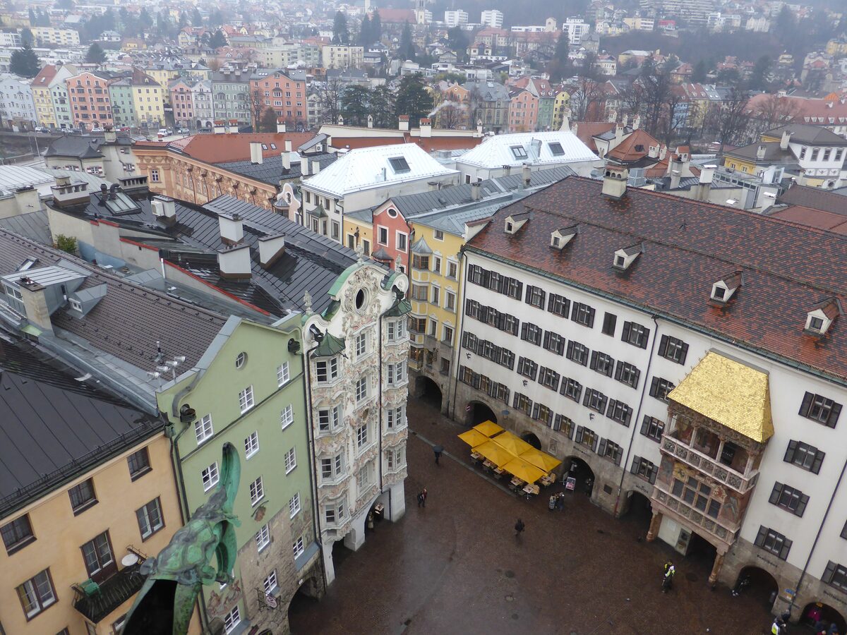 Rooftops of Innsbruck's old town seen from above, with the Golden Roof on the right