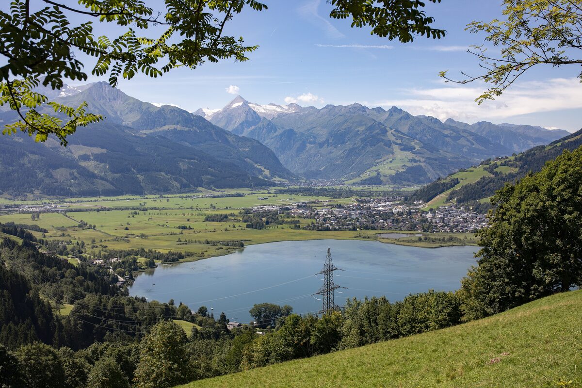 The Zeller See and the town in the valley, with the Hohe Tauern mountains behind