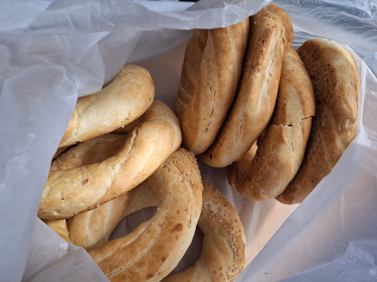 A paper bag full of Kraków obwarzanki, braided bread rings