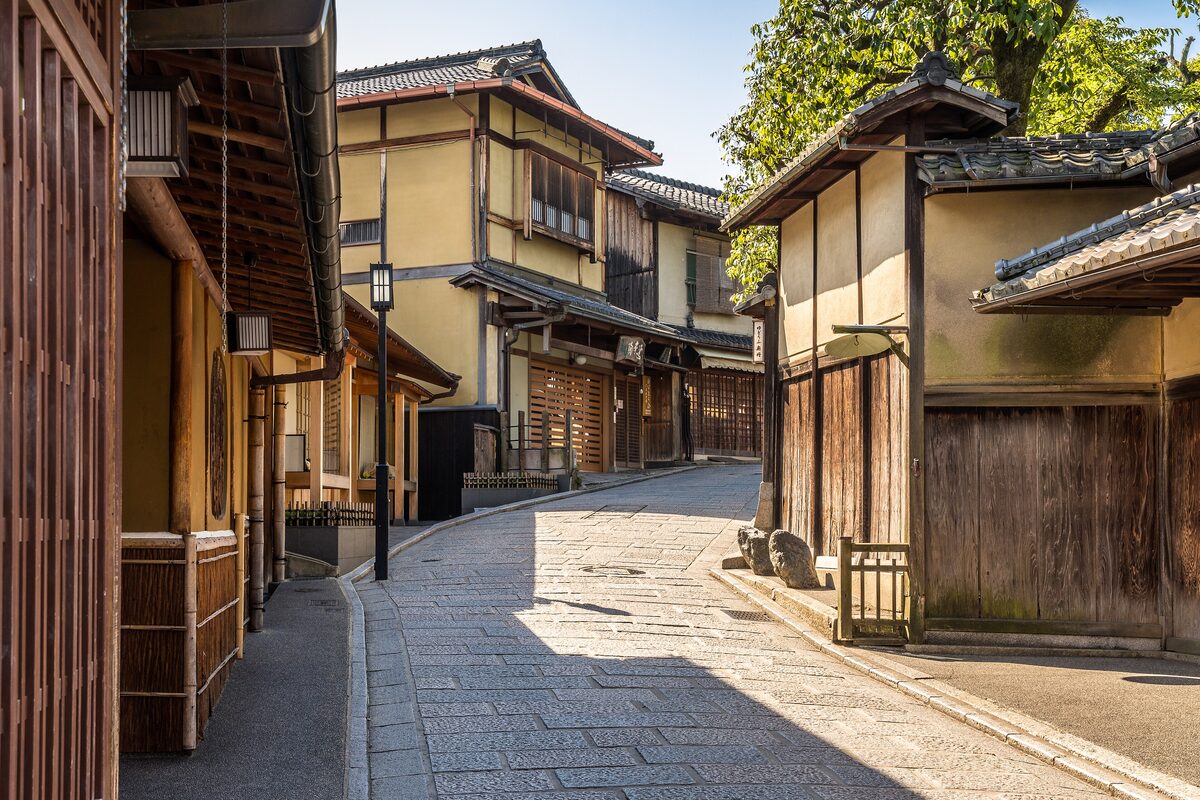 A stone-paved lane of old wooden houses on Ninenzaka, the slope below Kiyomizu-dera