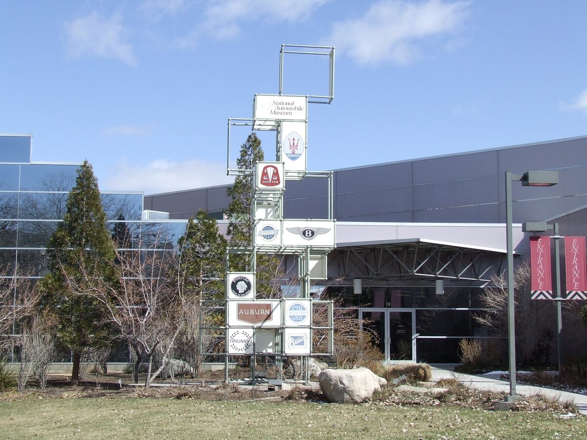 The National Automobile Museum in Reno, with its tall sign of car emblems in front of the building