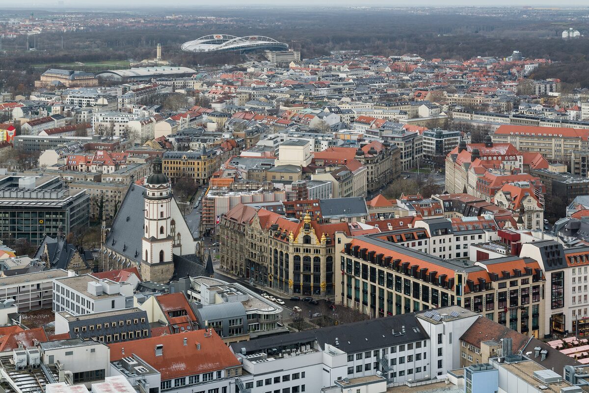 The view from the Panorama Tower over Leipzig's old town, with the Thomaskirche among the red roofs
