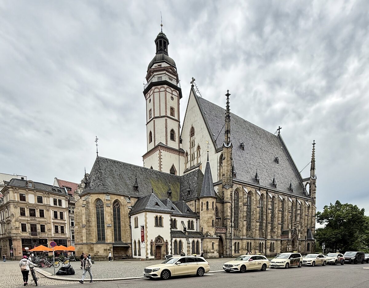 The Thomaskirche seen from the Thomaskirchhof, with its steep dark roof and white tower