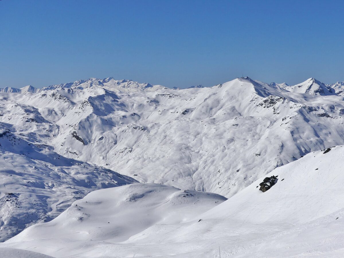 Snowy peaks and the Vallon du Lou seen from the Col de la Chambre on a clear day