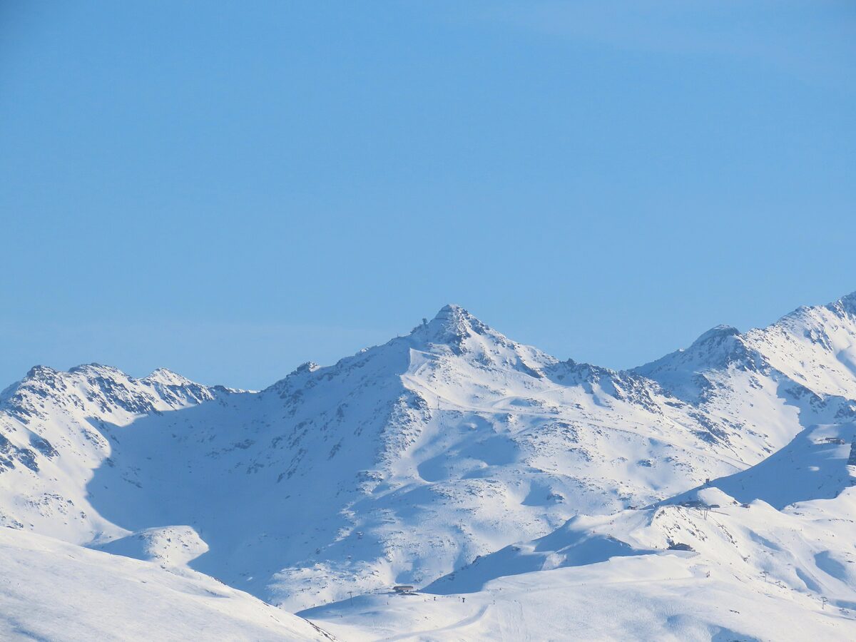 The snowy Mont Vallon peak seen from the Col du Gollet on a clear winter day