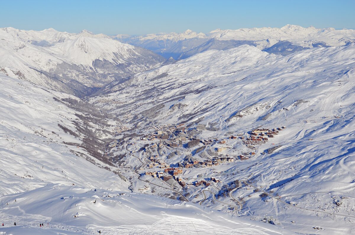 Les Menuires and the Belleville valley under snow, with the slopes running down toward the village