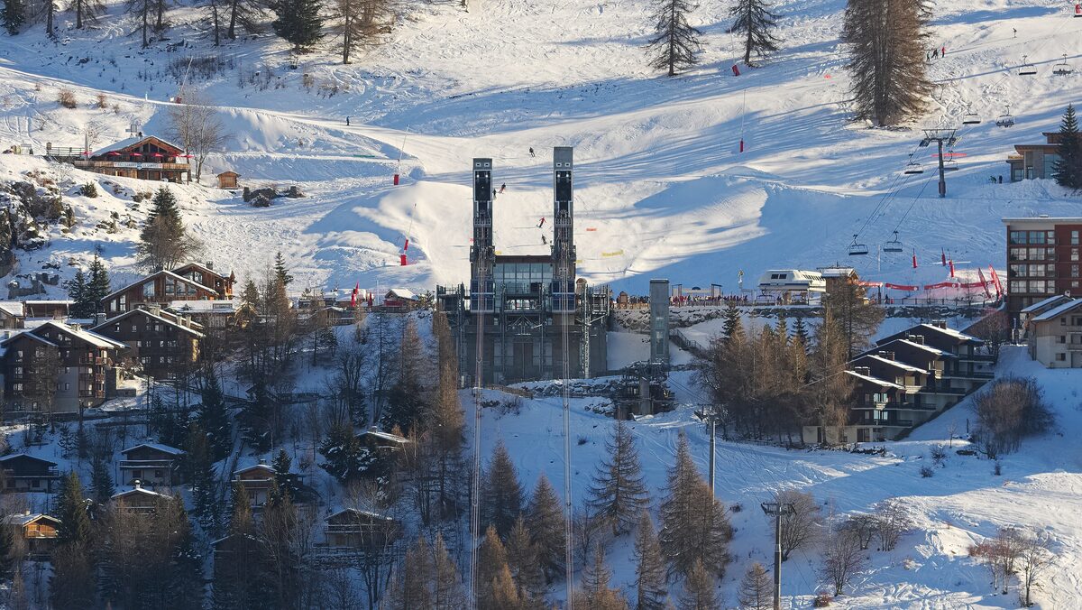 The chalets of Vallandry on snowy slopes, with the Vanoise Express arrival station beside the ski runs