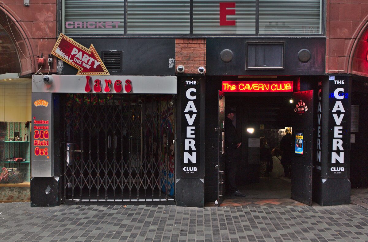 The entrance of the Cavern Club on narrow Mathew Street in Liverpool, with its sign over the door