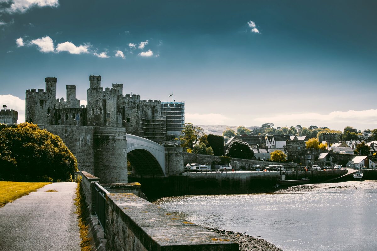 Conwy Castle and its bridge above the river estuary, with the town beside it
