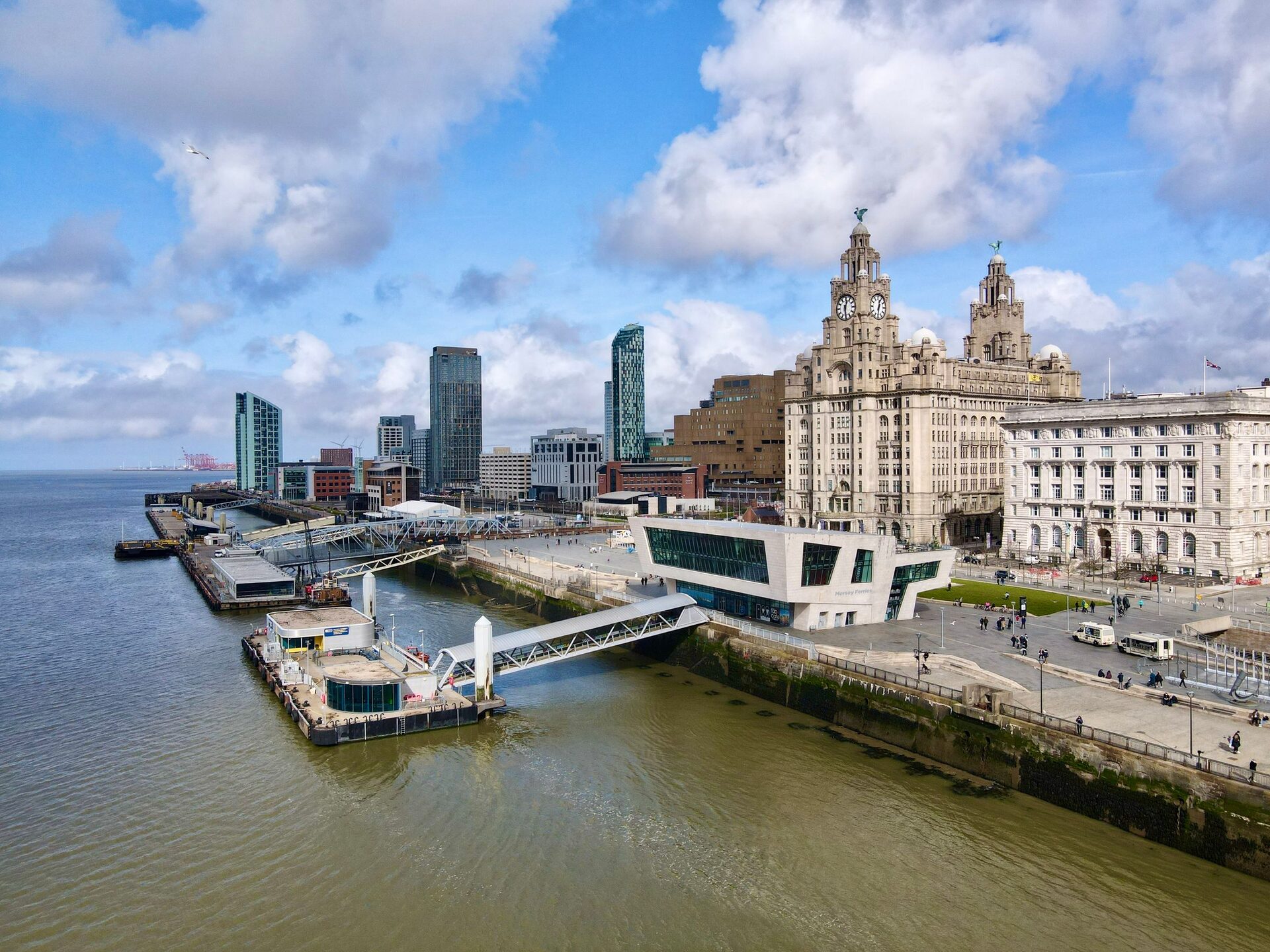 Aerial view of the Liverpool waterfront at Pier Head, with the Royal Liver Building and its clock towers, the ferry terminal and the River Mersey