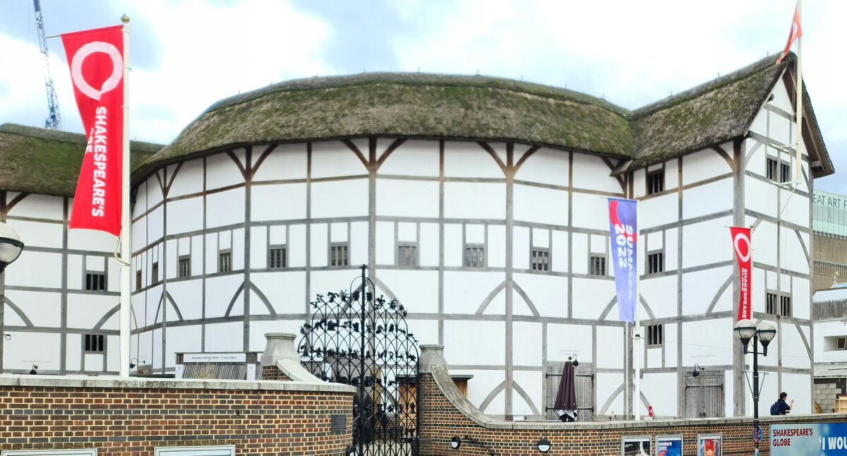 The round, half-timbered Shakespeare's Globe theatre with its thatched roof on the South Bank