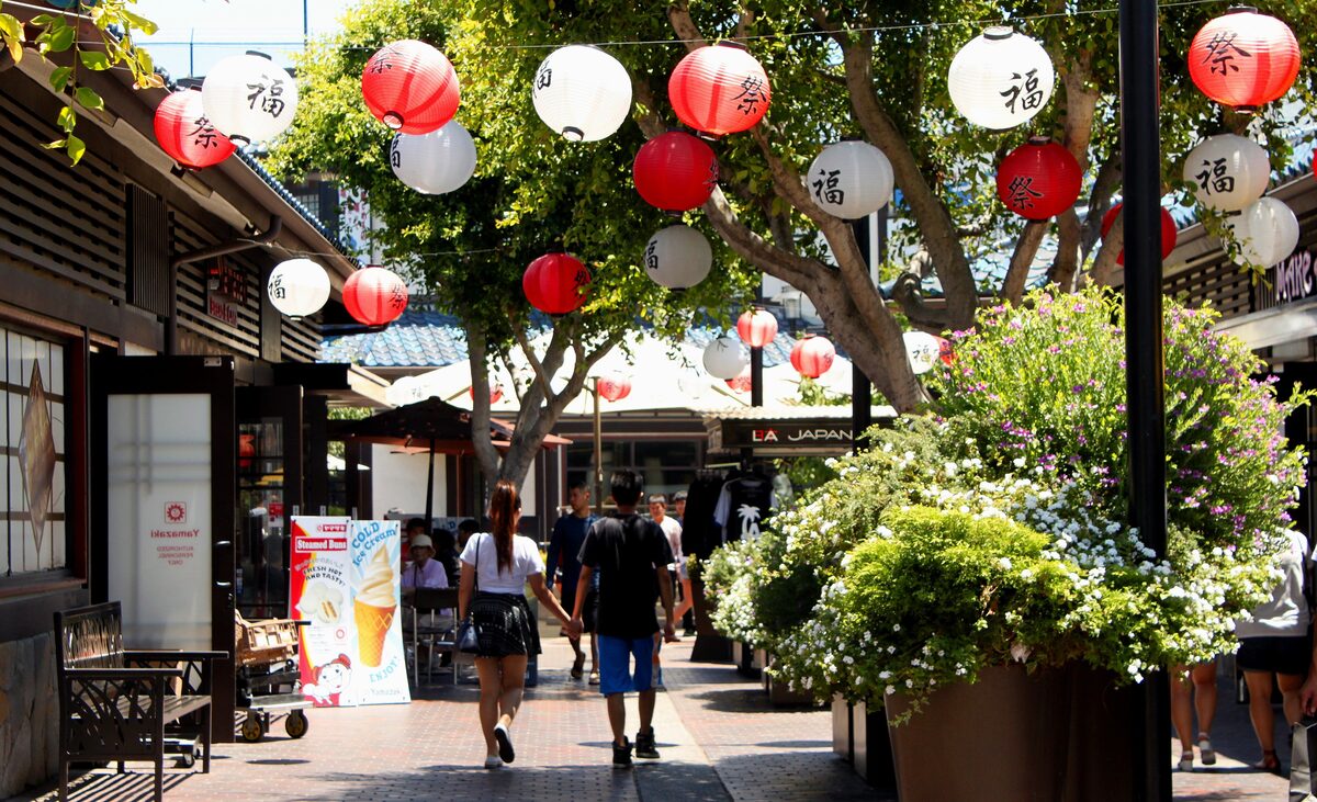 Red and white paper lanterns over the Japanese Village Plaza promenade in Little Tokyo