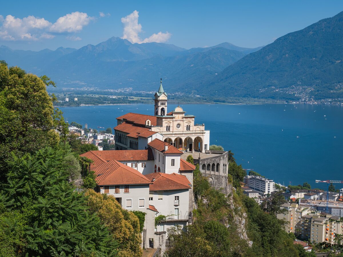 The terracotta-roofed Madonna del Sasso sanctuary on its rock above Locarno and Lake Maggiore