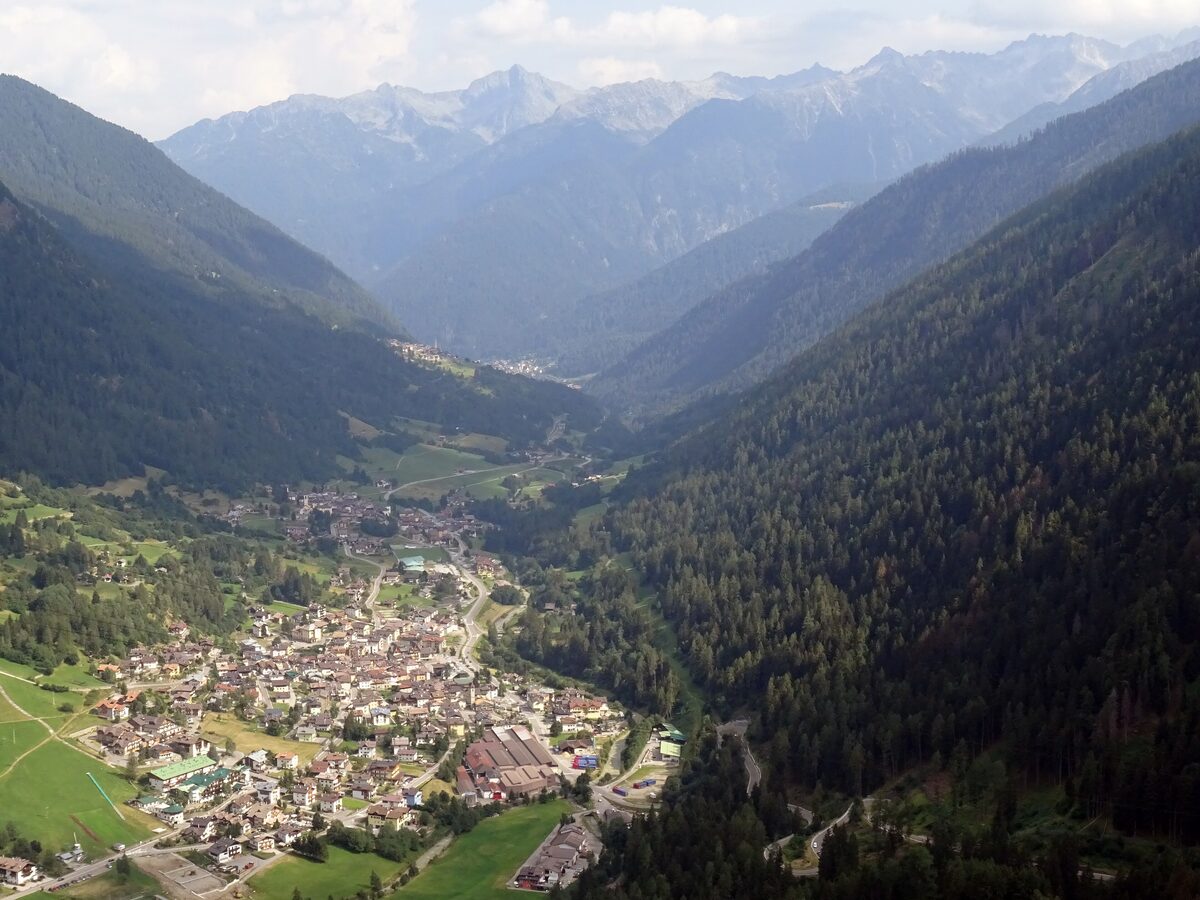 The Val di Peio, a side valley of the Val di Sole, with forested slopes and snowy peaks in the distance