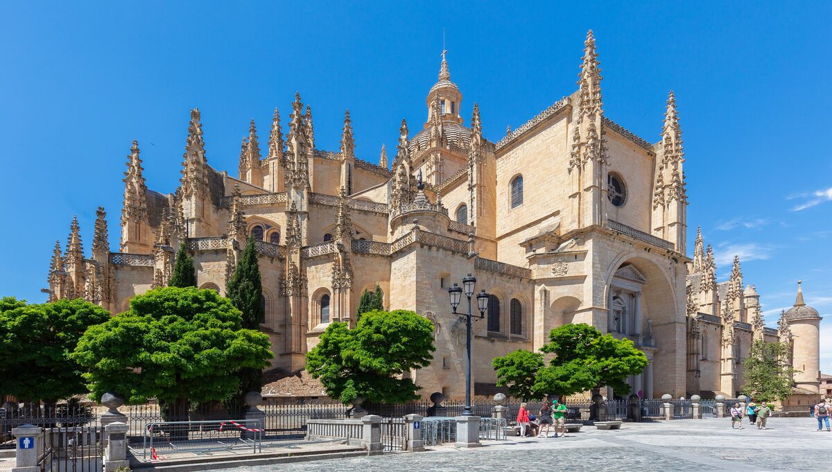 The late-Gothic Segovia Cathedral with its many pinnacles, seen from the square in front