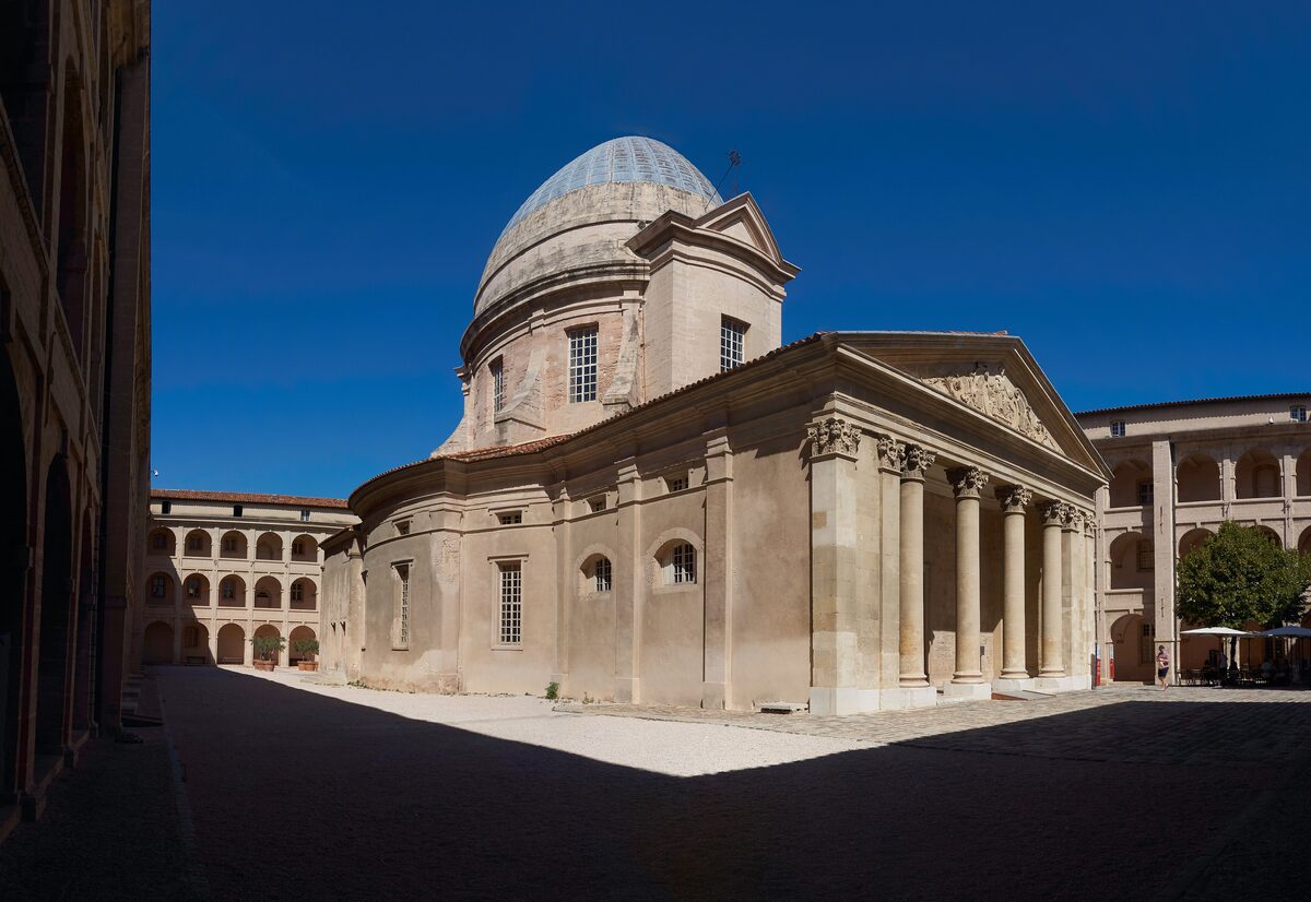The chapel of the Vieille Charité, its dome and pedimented facade closing the arcaded courtyard